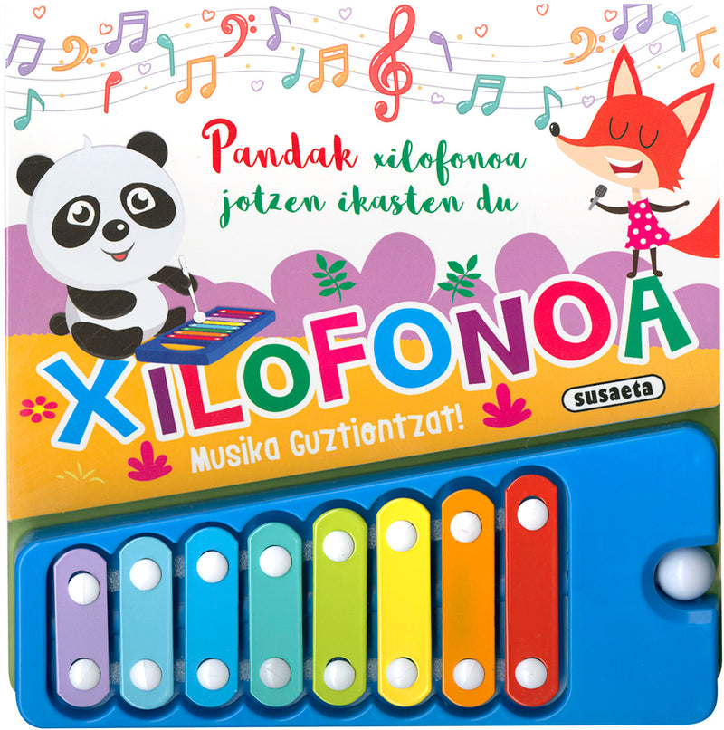 Pandak xilofonoa jotzen ikasten du